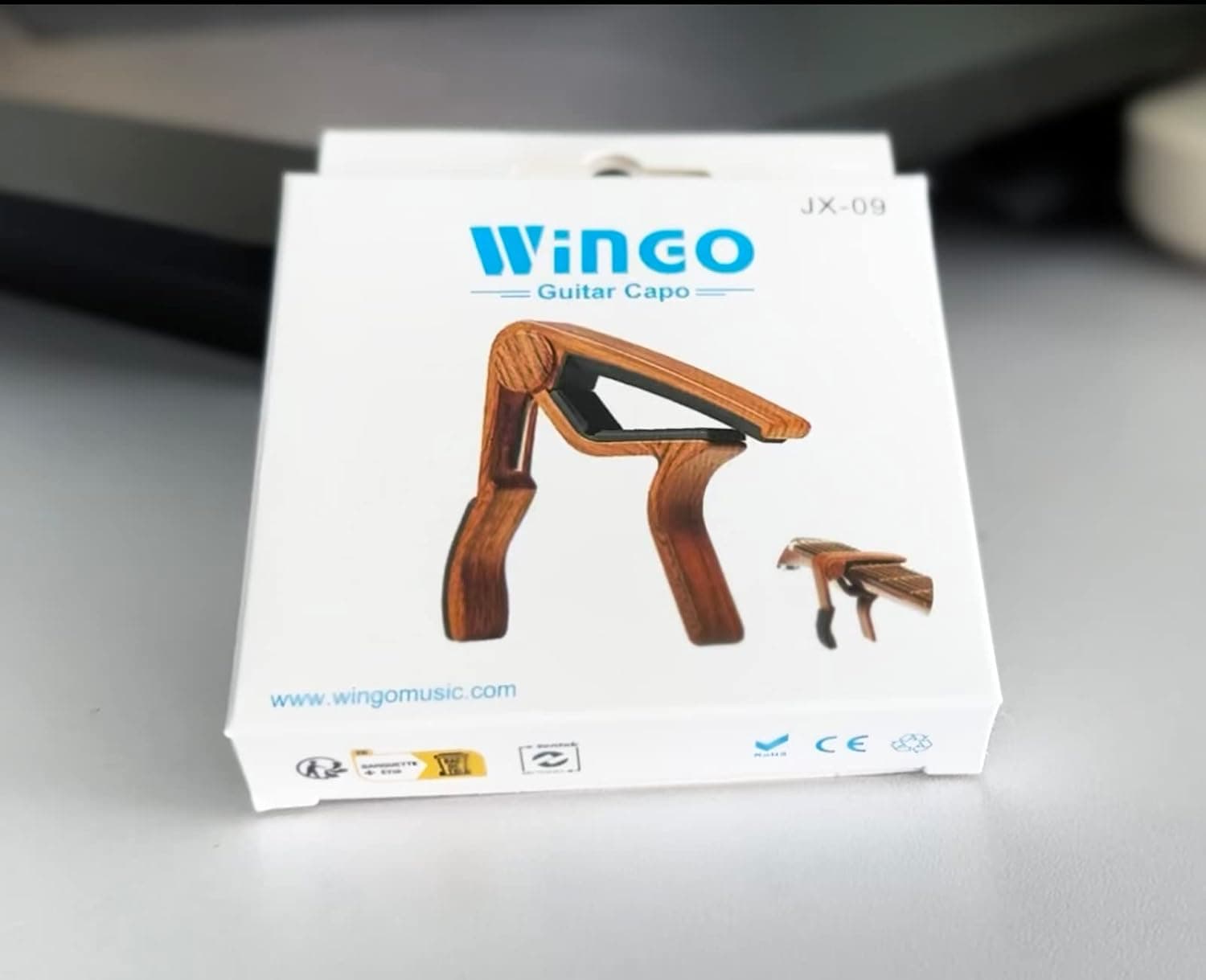 WINGO Guitar Capo for Acoustic and Electric Guitars - Rosewood Color with 5 Picks - Image 9