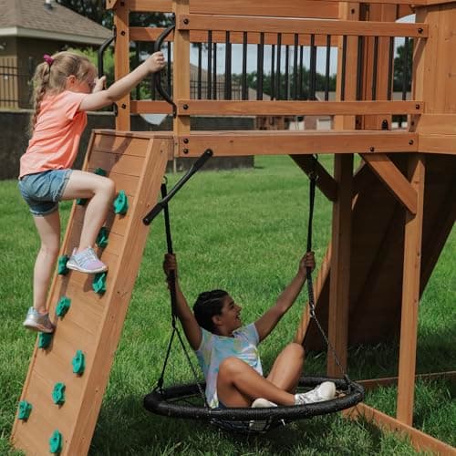 Backyard Discovery Sterling Point Cedar Wood Swing Set with Wave Slide, Raised Clubhouse, Wooden Bridge, Rock Wall, Belt Swings, Web Swing, Trapeze, Balcony, Climbing Wall, Ladder, Outdoor Playset - Image 4