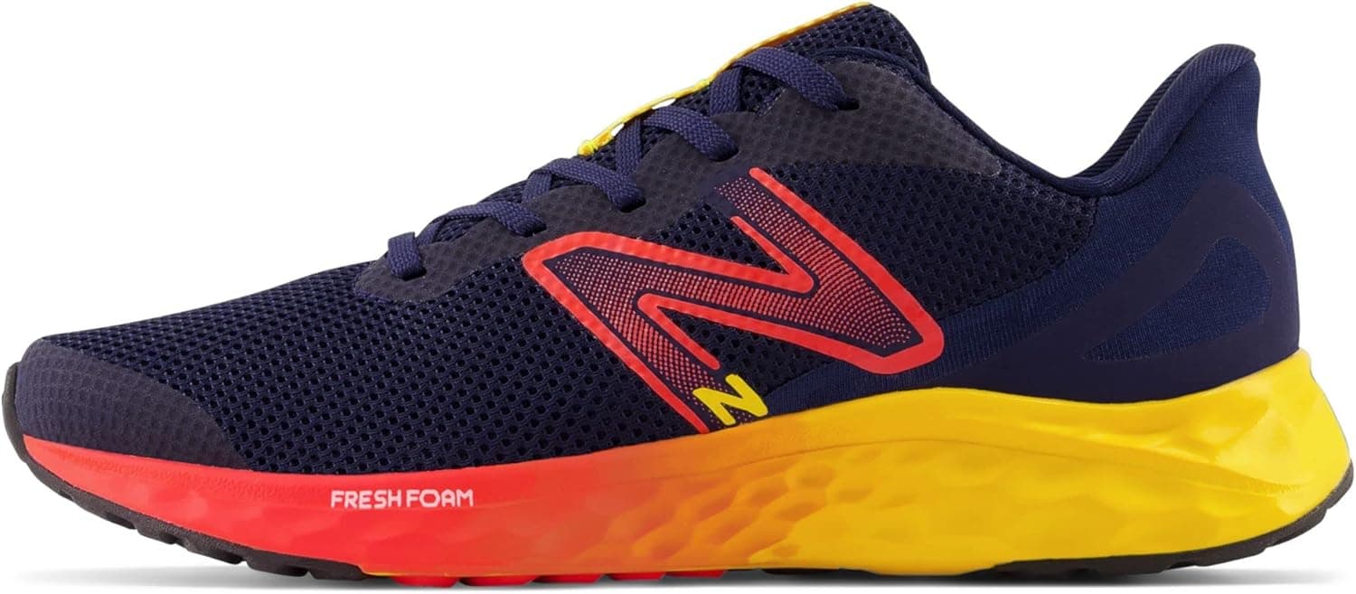 New Balance Kids Arishi Fresh Foam v4 Sneaker Team Navy/Electric Red/Egg Yolk 5.5 Big Kid - Image 9