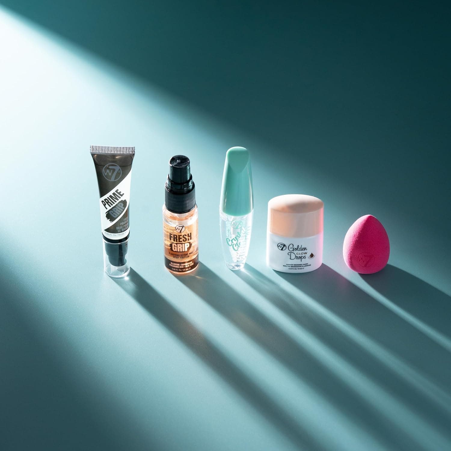 W7 On the Go Essentials Gift Set - Mini Makeup Must-Haves with Primer, Setting Spray, Mascara, Golden Glow Bronzing Drops & Beauty Sponge - Travel or Handbag Size Essentials - Image 3