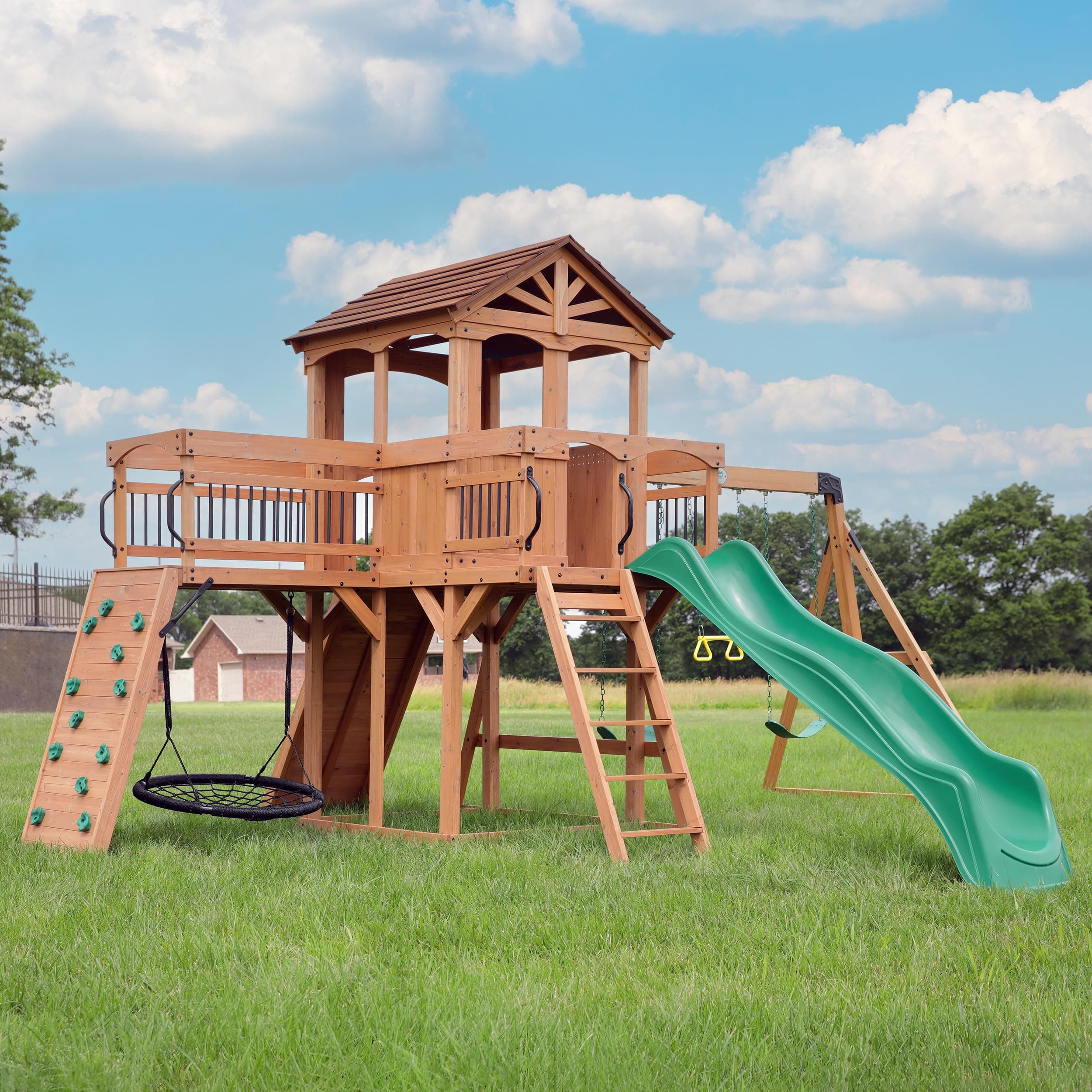 Backyard Discovery Sterling Point Cedar Wood Swing Set with Wave Slide, Raised Clubhouse, Wooden Bridge, Rock Wall, Belt Swings, Web Swing, Trapeze, Balcony, Climbing Wall, Ladder, Outdoor Playset Green