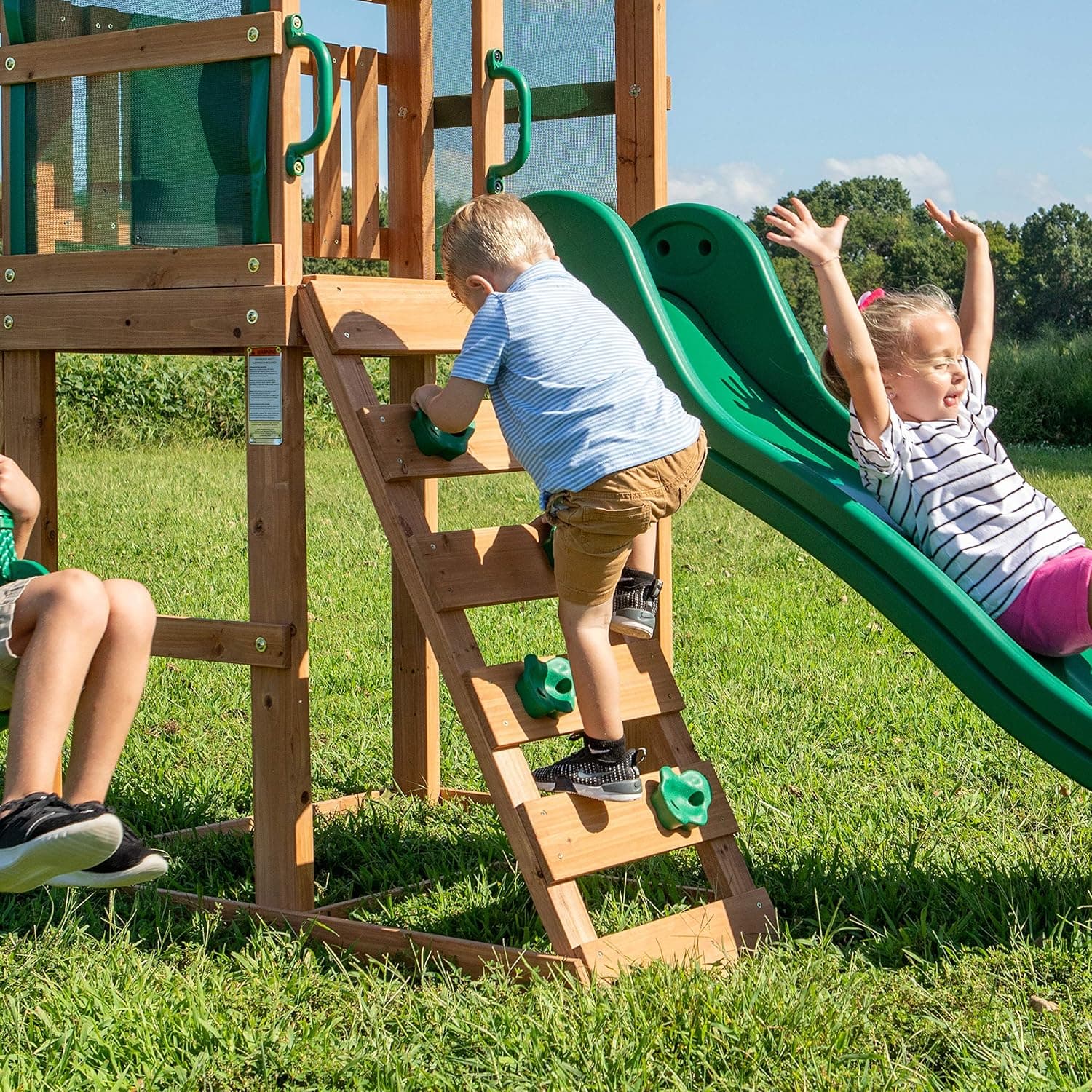 Backyard Discovery Buckley Hill Cedar Wood Swing Set with Wave Slide, Play Deck, Rock Wall Ladder, Belt Swings, Chalkboard, Canopy Roof, Outdoor Playset Green - Image 5