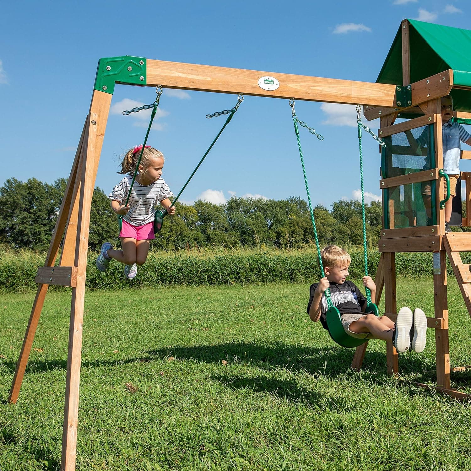 Backyard Discovery Buckley Hill Cedar Wood Swing Set with Wave Slide, Play Deck, Rock Wall Ladder, Belt Swings, Chalkboard, Canopy Roof, Outdoor Playset Green - Image 4